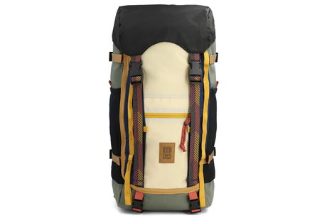 Multicolored backpack with a visible brand label on a white background