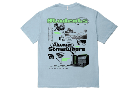 Light blue t-shirt with graphic design and text on a white background