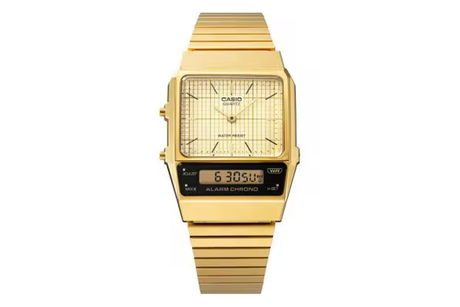 Gold Casio watch on a white background
