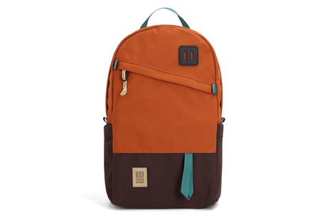 Two-tone brown and orange backpack with a visible brand label on a white background