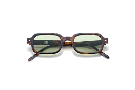 Sunglasses with tortoiseshell frame and reflective lenses on a white background