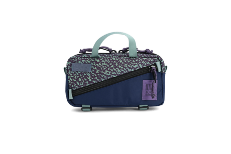 Small bag with a patterned top section and solid bottom section on a white background