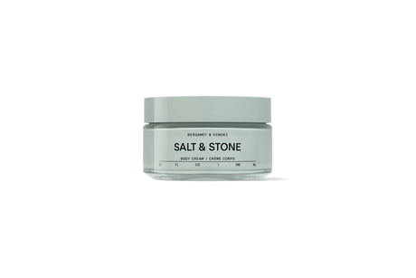 Jar of Salt & Stone body cream on a white background