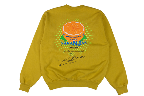 Yellow sweatshirt with a graphic design on the back featuring an orange and text.
