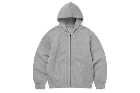 Gray hoodie with a zipper on a white background