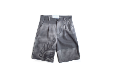 Gray shorts with flame design on a white background