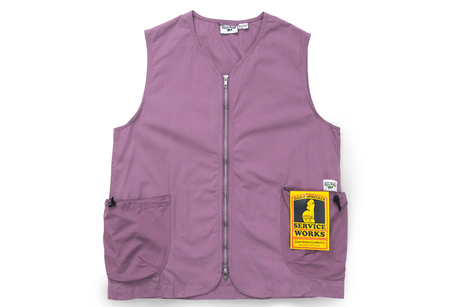 Purple vest with a yellow patch on a white background