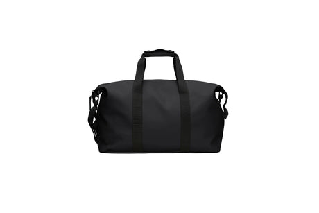 A black nylon duffel bag with dual top carry handles and side compression straps, shown against a plain white background.
