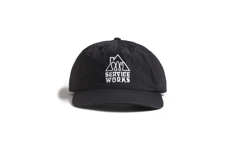 Black cap with 'Service Works' logo on a white background