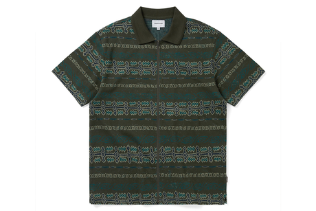 Green patterned shirt on a white background