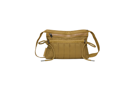 Tan crossbody bag with multiple zippers on a white background