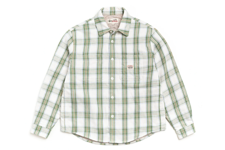 Green and white plaid shirt on a white background