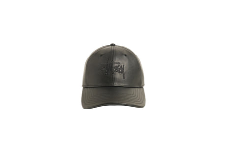 A dark olive green Stussy baseball cap with a tonal embroidered logo on the front, shown against a plain white background.