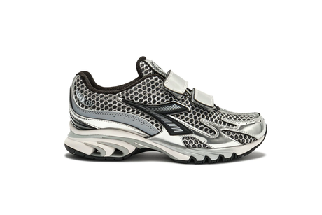 Silver and black athletic shoe on a white background