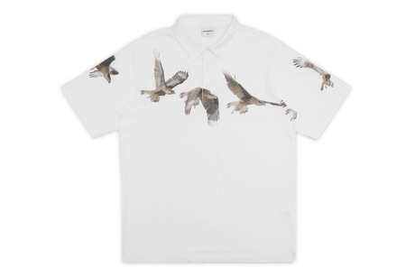 White polo shirt with bird prints on a white background