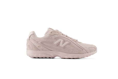 Pink New Balance sneaker on a white background