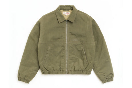 An olive green corduroy jacket with a front zipper, collar, and elasticized cuffs and hem, laid flat against a white background.