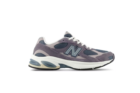 Gray sneaker with a white sole on a white background