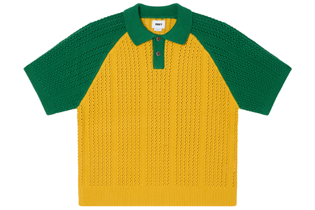 Yellow and green knitted sweater with a collar on a white background