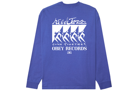 Blue long-sleeve shirt with white graphic design on a white background
