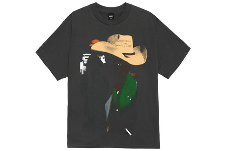 A dark charcoal gray t-shirt featuring a stylized graphic print of a cowboy in a tan hat and green jacket, shown flat against a solid white background.