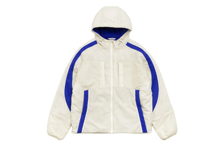 A hooded puffer jacket in off-white with vibrant blue contrast panels on the shoulders and sides, shown flat against a solid white background.