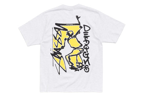 A white short-sleeve T-shirt shown flat against a white background, featuring a large back graphic in yellow and black with stylized text and a figure illustration.