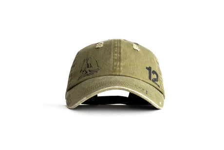 An olive green distressed baseball cap with a black embroidered ship logo on the front left and the number '12' on the front right, shown against a plain white background.
