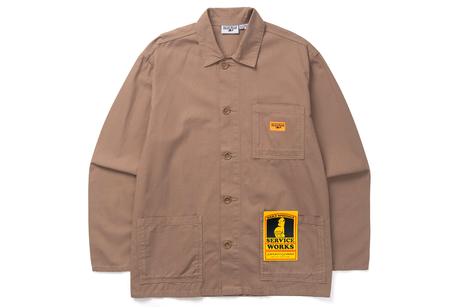 Brown jacket with a patch on a white background