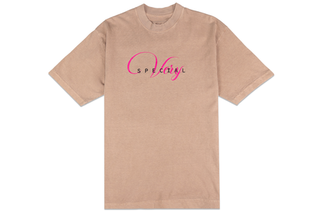 Beige t-shirt with pink and black text on a white background