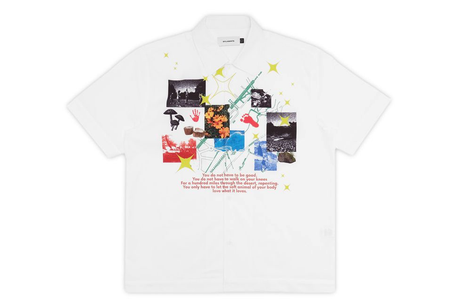 White t-shirt with colorful graphic design on a white background