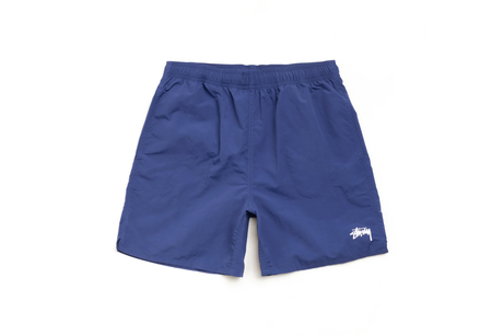 Blue shorts with a brand logo on a white background