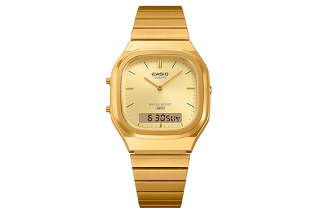 Gold Casio Watch on white background.