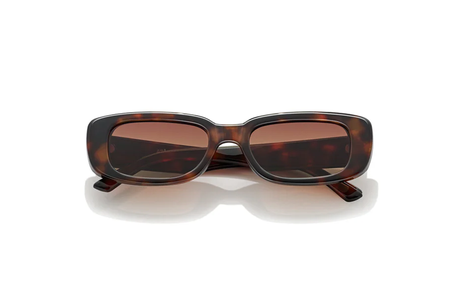 Sunglasses with tortoiseshell frame and brown lenses on a white background