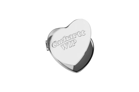 A polished silver heart-shaped compact mirror with 'Carhartt WIP' engraved on the front, shown open against a plain white background.